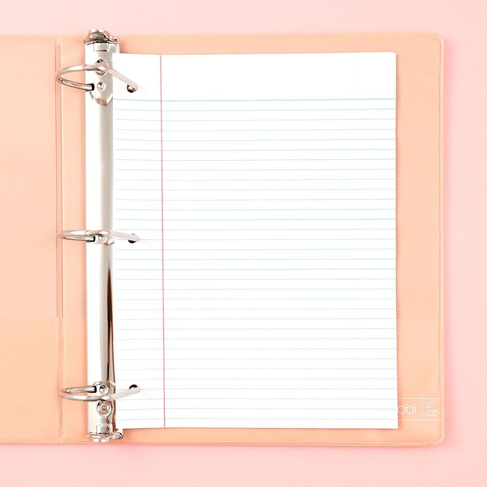 inside of open 3-ring binder showing 3-hole punch college-ruled paper inside binder and inside pockets on both sides