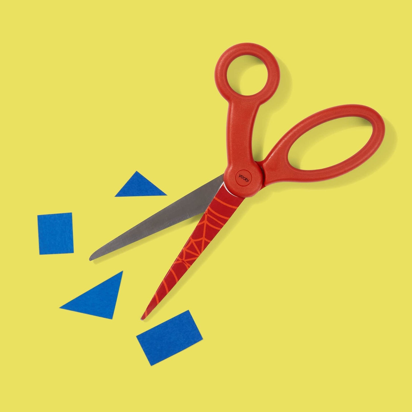 red scissors with red Spider-Man web design on top blade